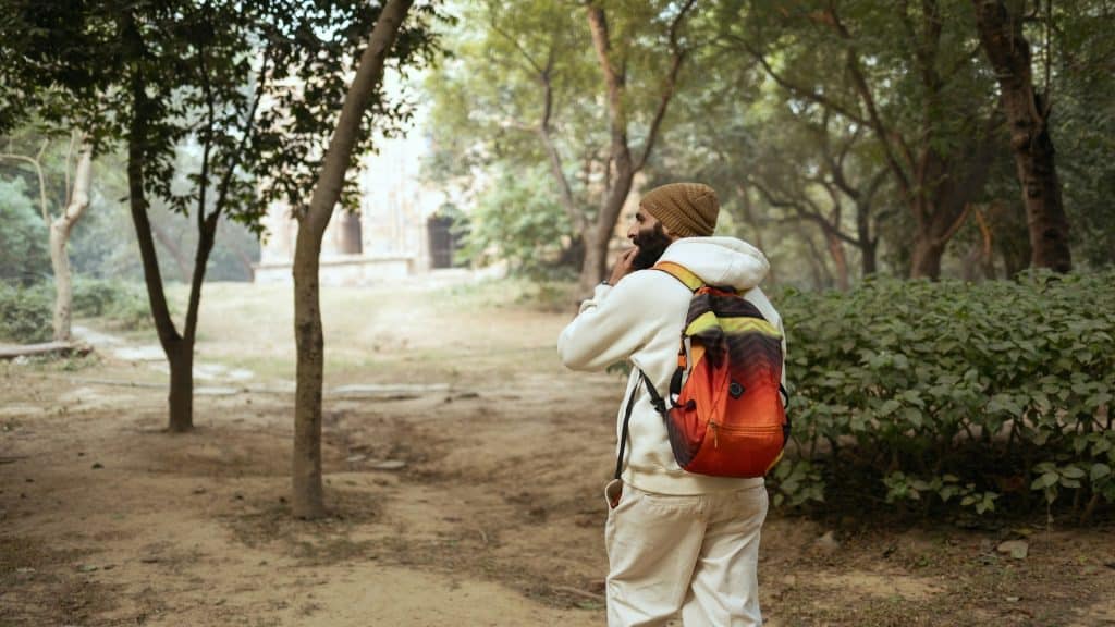 man walking alone outdoors