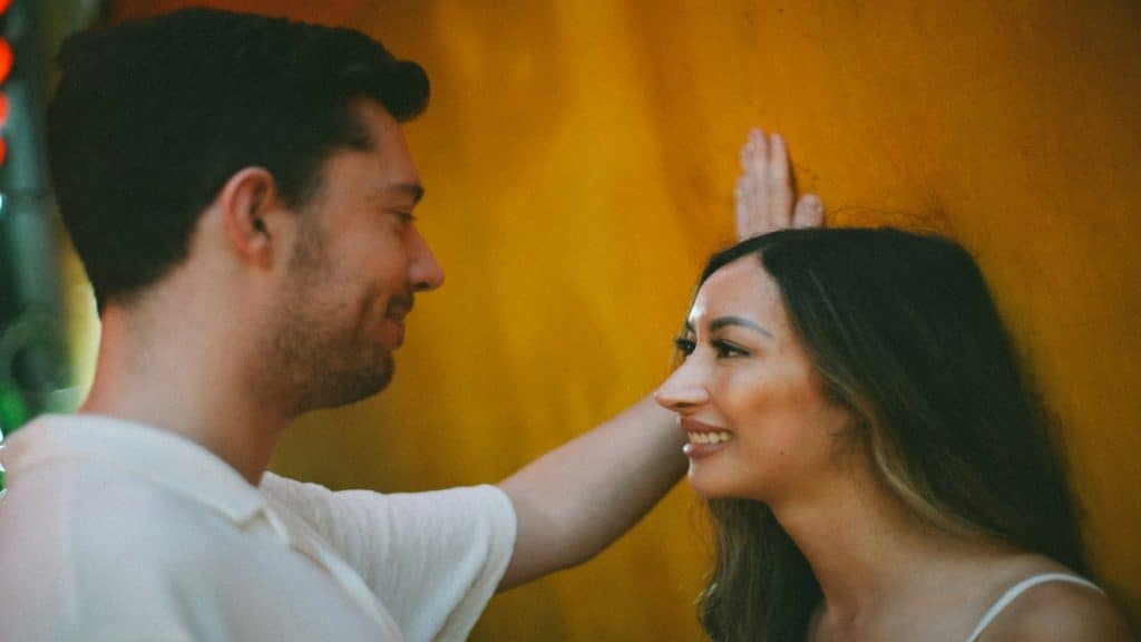 woman smiling at man after small gesture