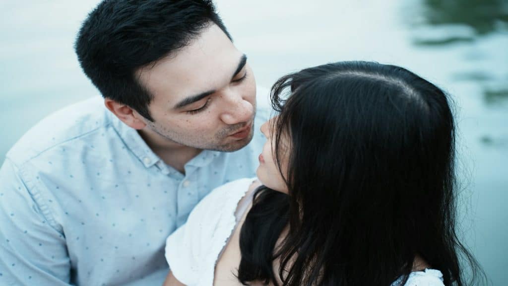 man observing partner carefully