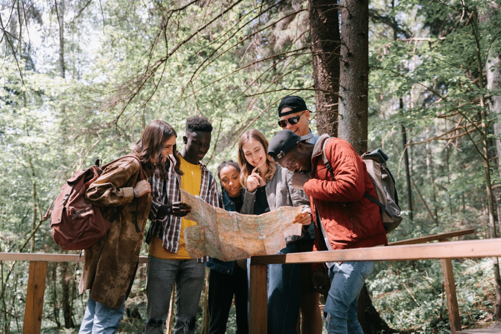 A group of people looking at the map