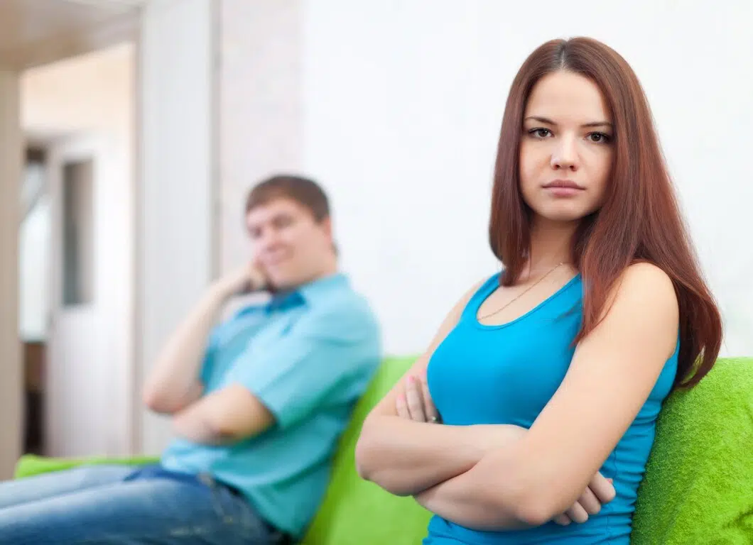 A woman and a man are having a quarrel