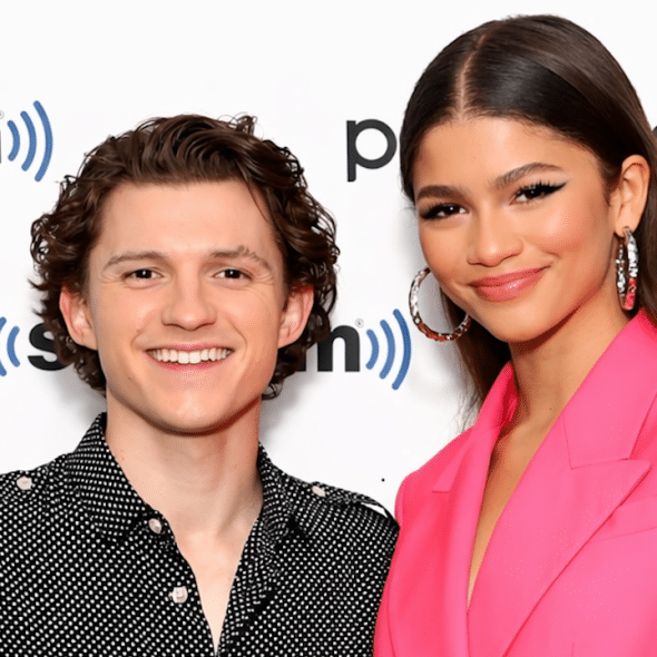 A picture of Zendaya and Tom Holland smiling.