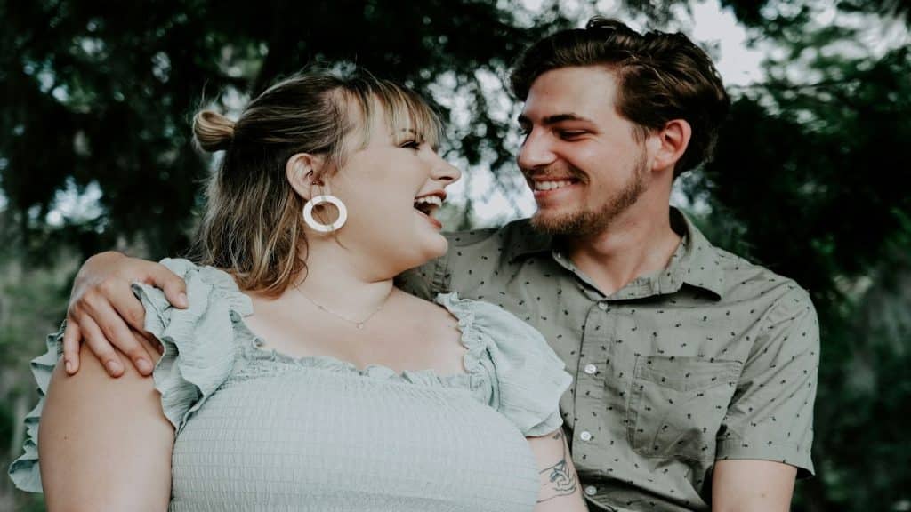 couple laughing casually together