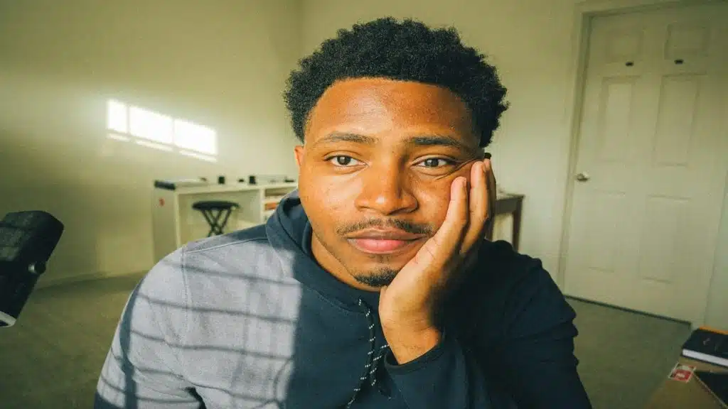 person looking overwhelmed while thinking