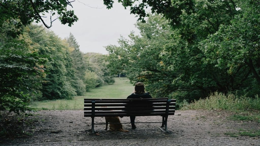 person sitting alone, deep in thought