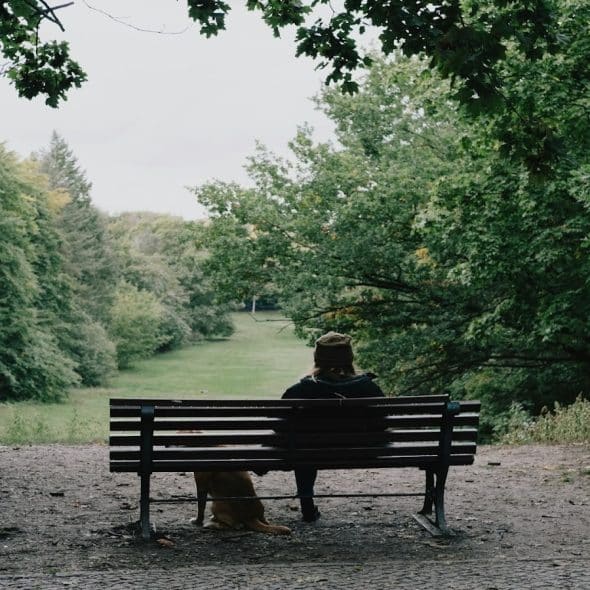 person sitting alone, deep in thought