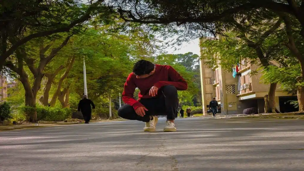 person pausing before making a move