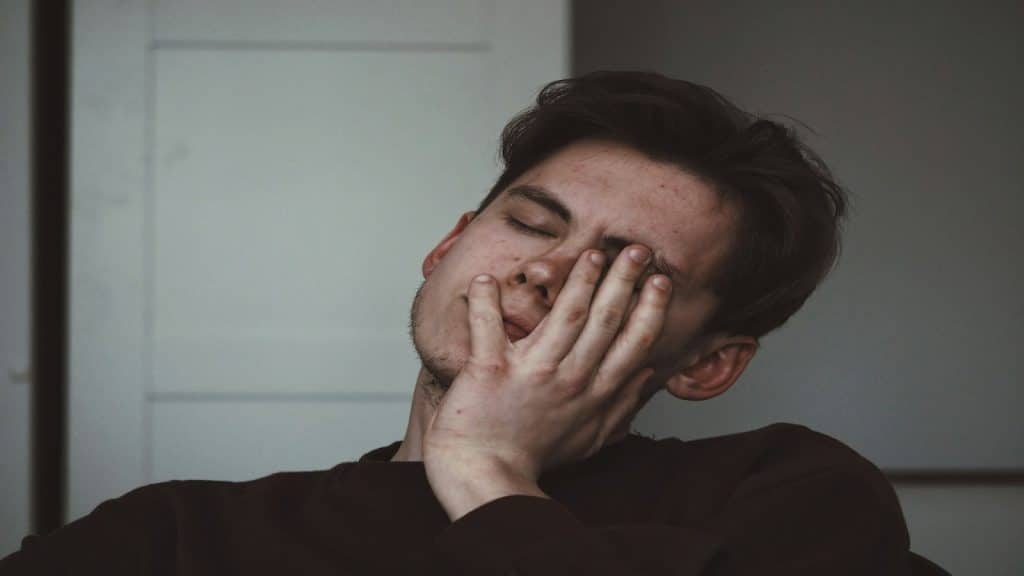 man feeling emotionally tired