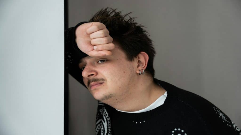 man feeling self-aware