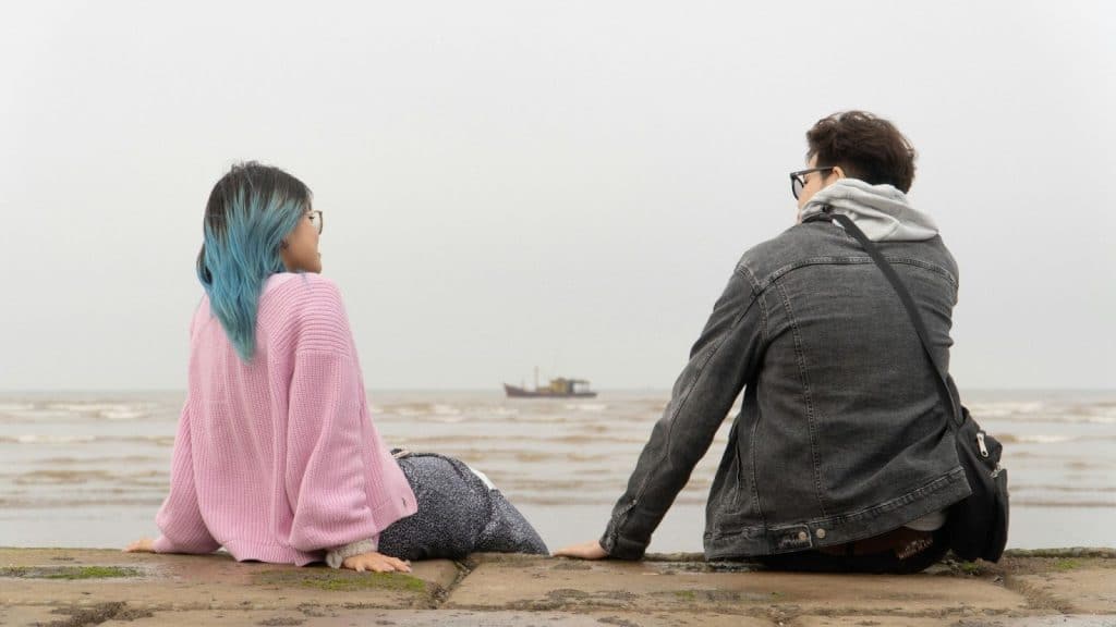 A man and woman talking