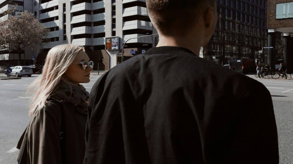A couple walking the street at daytime