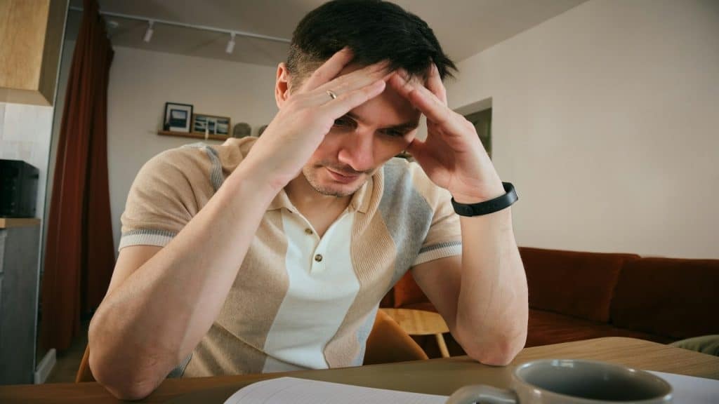 man noticing lack of progress