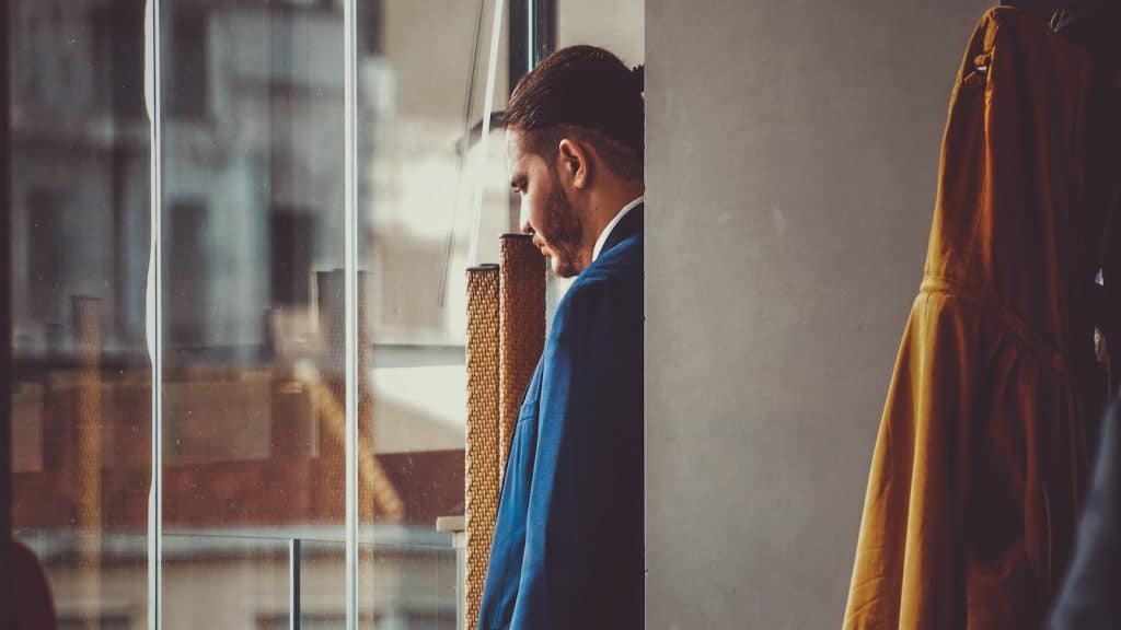 man reflecting on choice