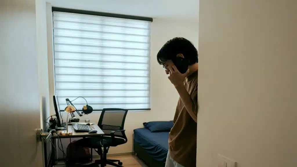 man noticing someone across the room