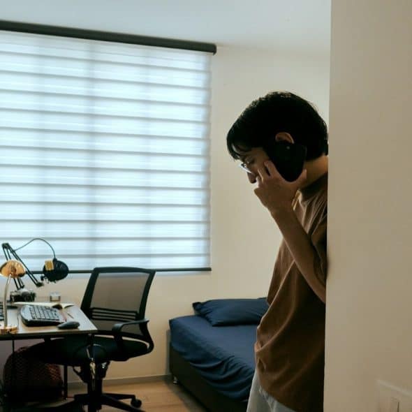 man noticing someone across the room