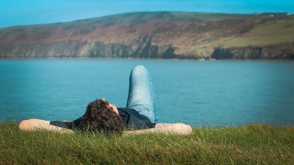 person appearing open and relaxed