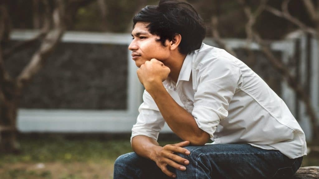 man thinking before acting