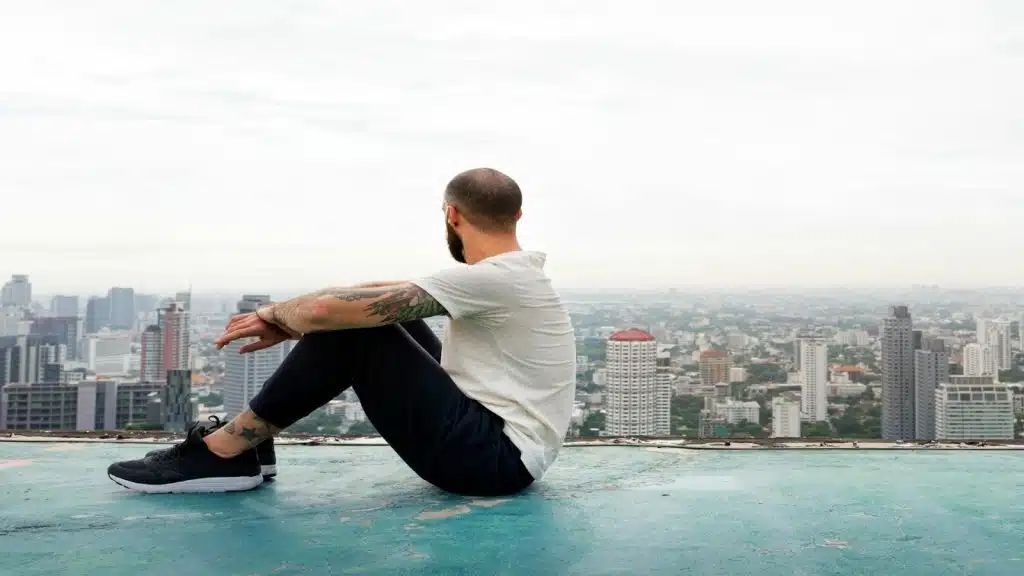 man sitting alone in quiet space
