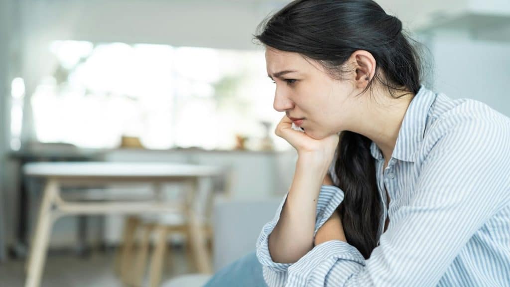 person overthinking quietly