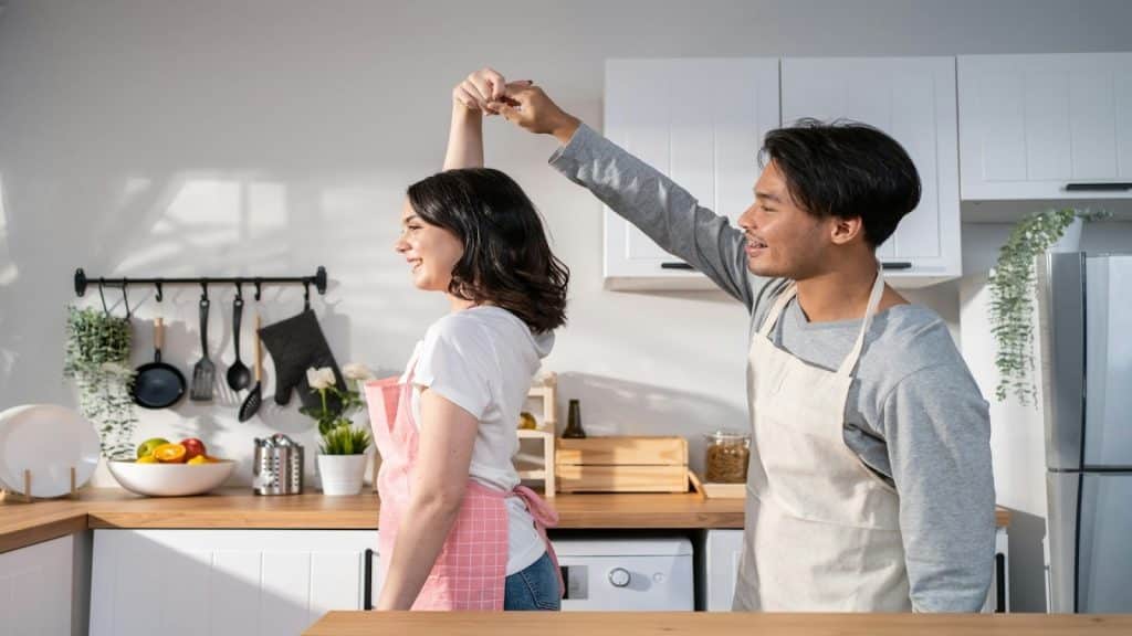 couple in different routines at home