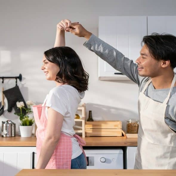 couple in different routines at home