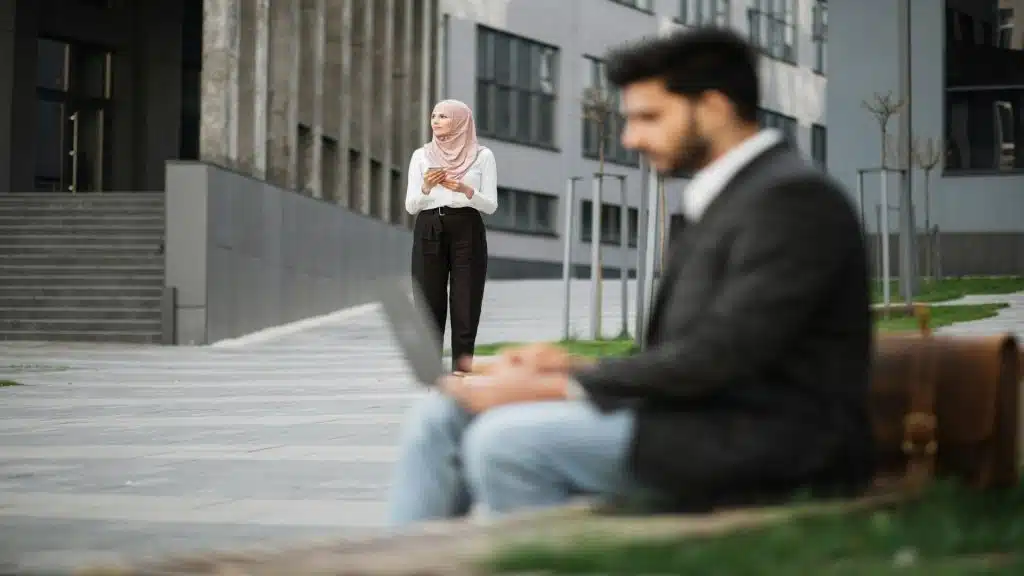 man appearing distant while partner waits