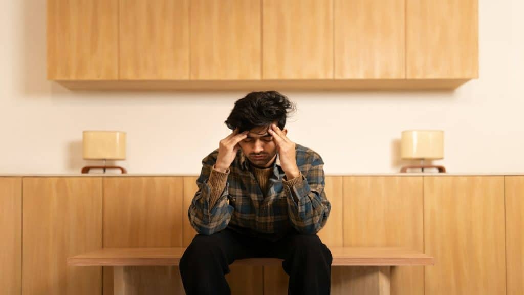 man stressed with responsibilities