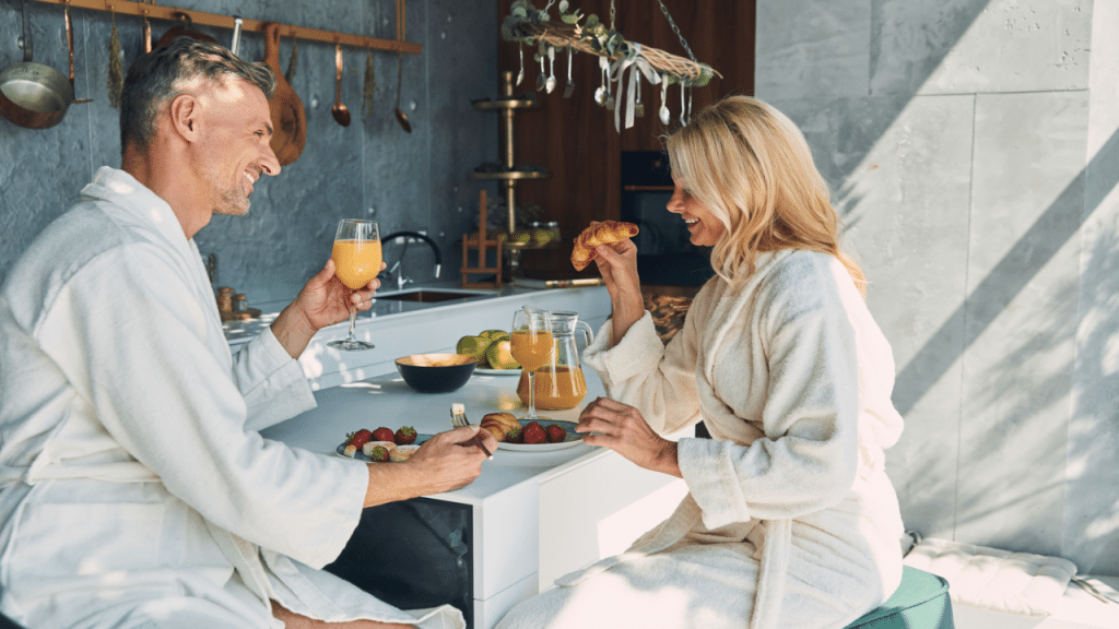 A mature couple enjoying breakfast together