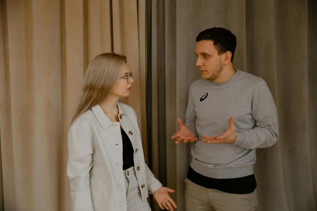 A man criticizing a woman