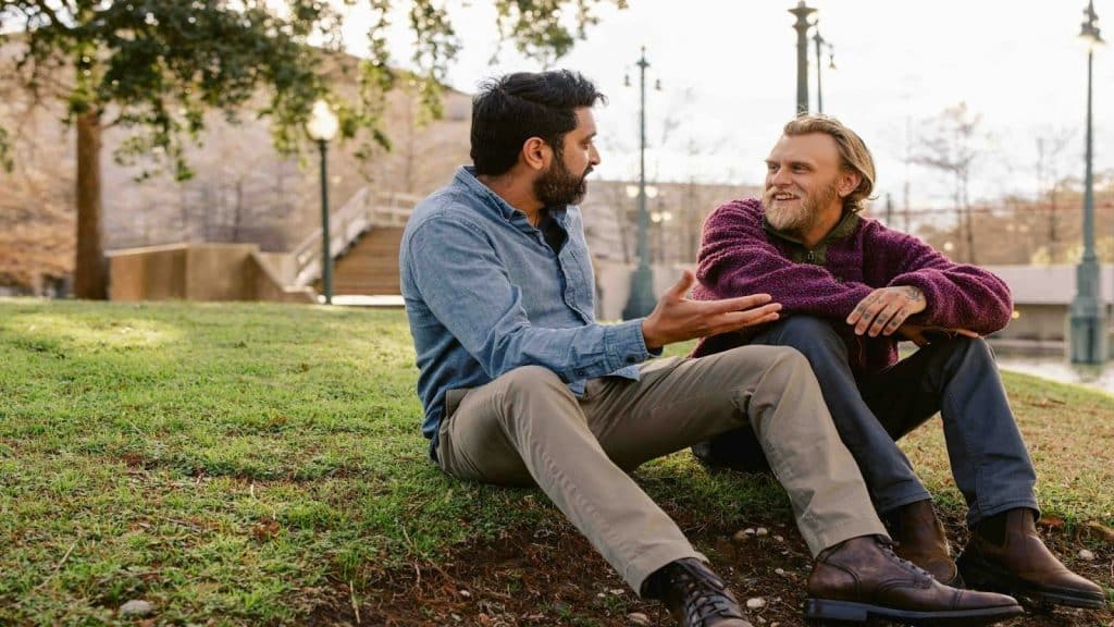 man relaxed in conversation