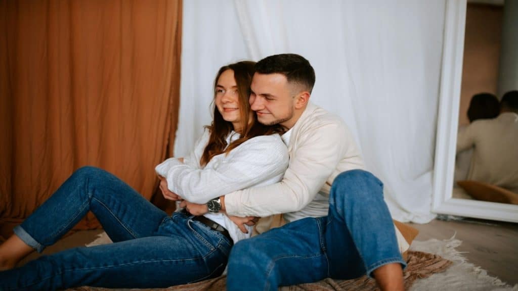 couple sitting together calmly after initial excitement fades