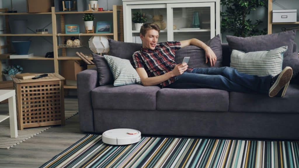 A man comfortable at the sofa