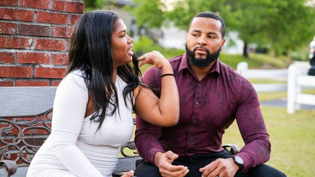 A man observing woman