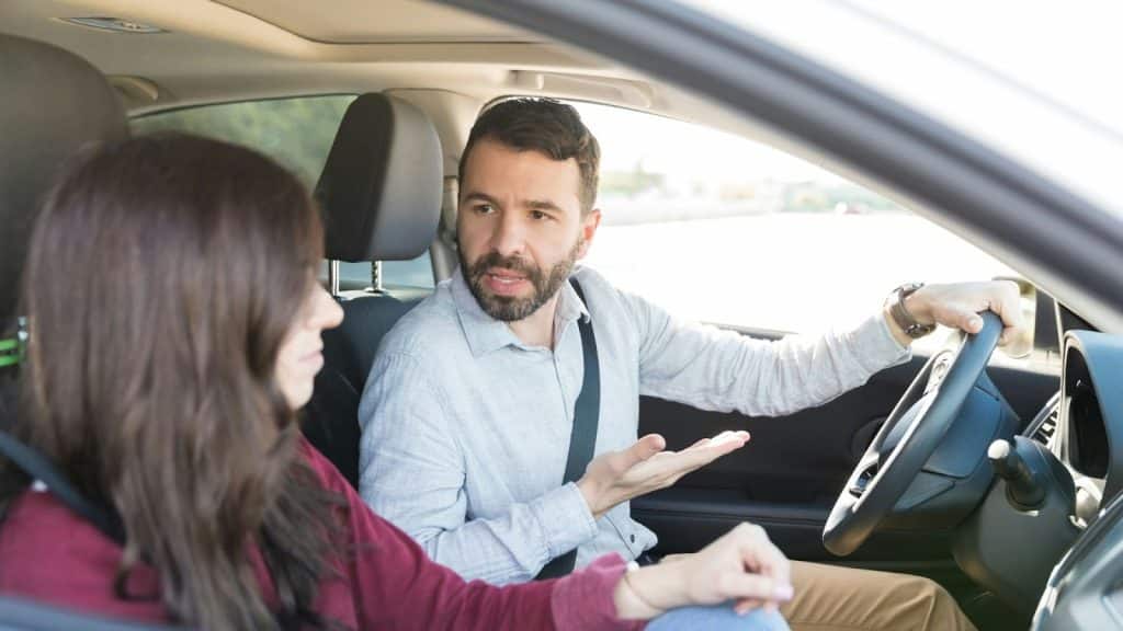 A man talking to woman