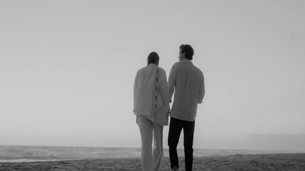 couple standing still without direction