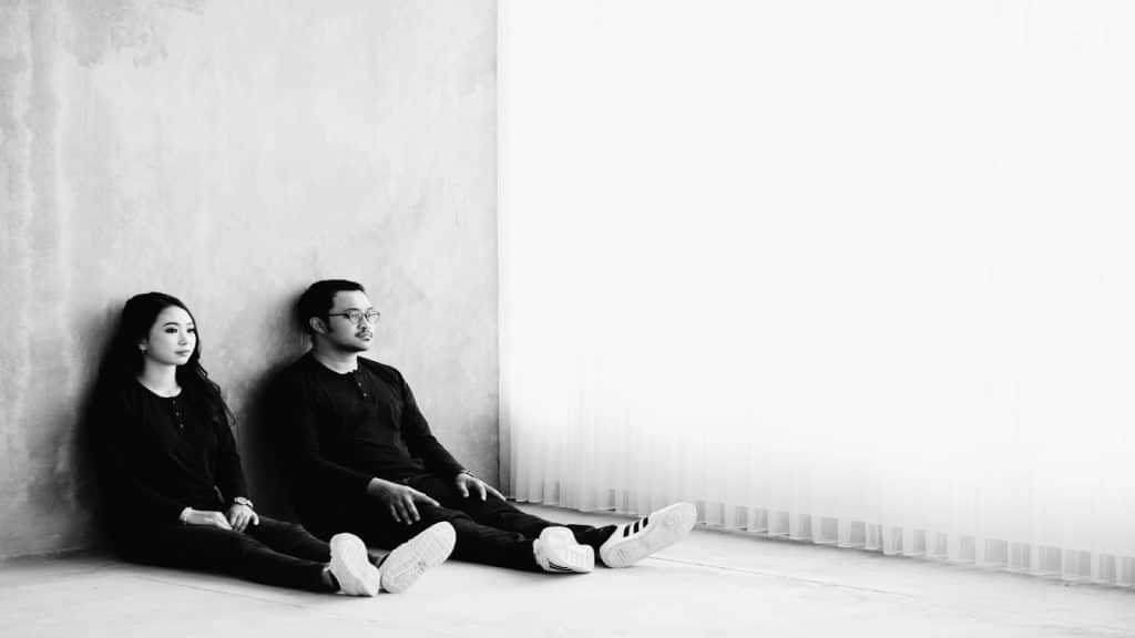 couple sitting together quietly with a sense of distance