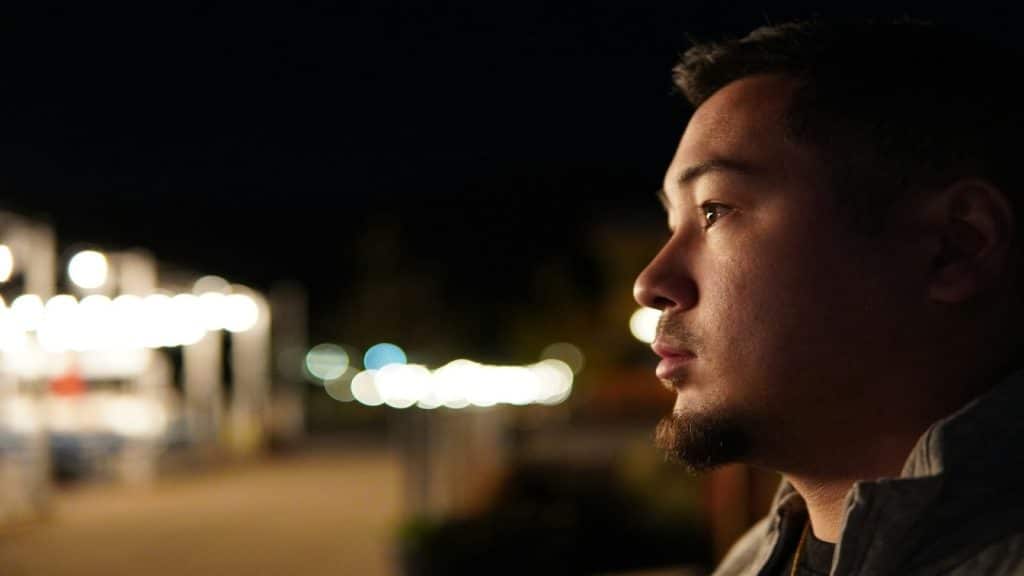 man looking thoughtful and distant