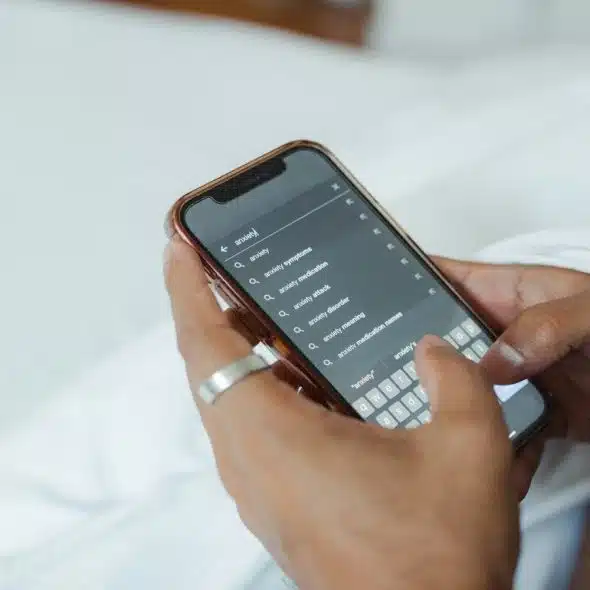 person scrolling through relationship content on a phone