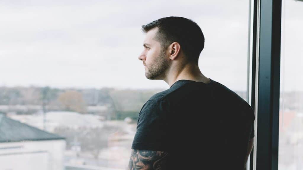 man appearing emotionally distant