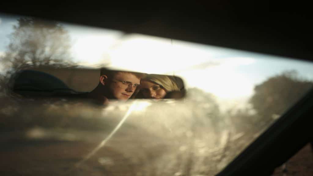 man looking calm while partner reflects
