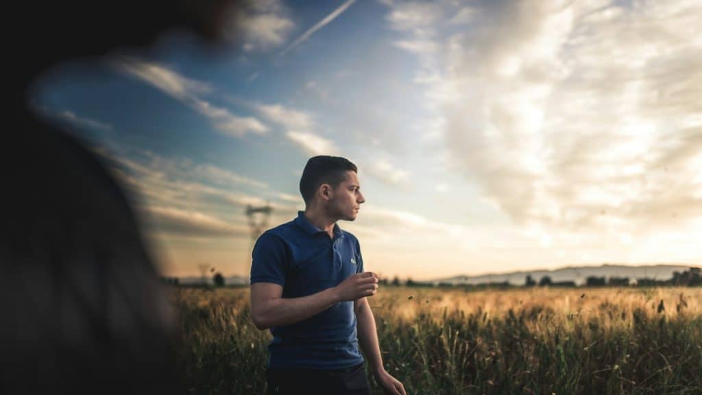 man appearing distant in conversation