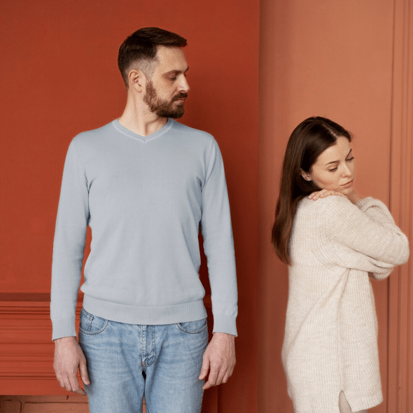 A man looking at the woman