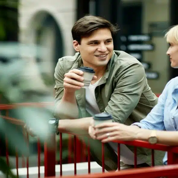 A man talking while a woman listens