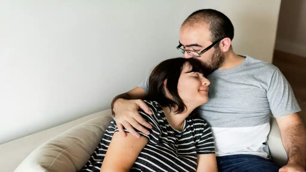A couple relaxing at home