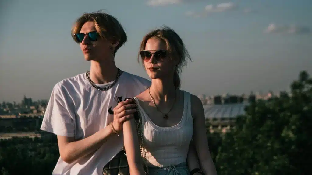 A man and a woman standing next to each other.