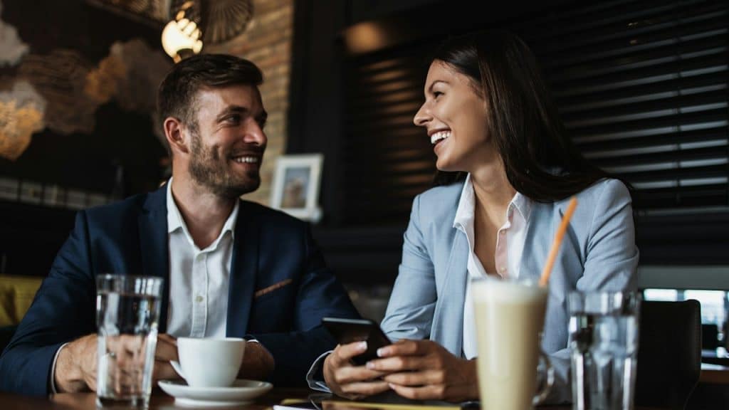 A couple having coffee in a restaurant.