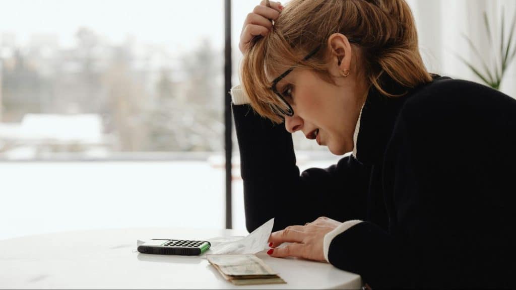 Woman computing finances