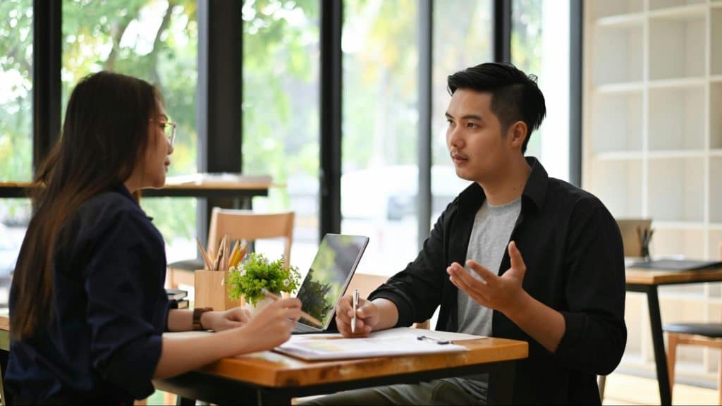 A man and woman having a discussion