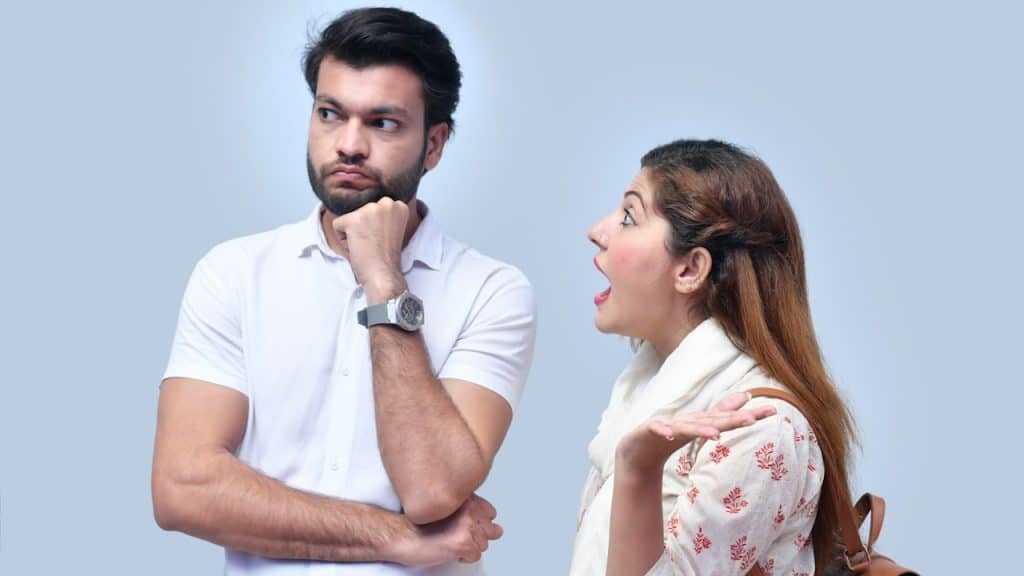 A husband ignoring his complaining wife.