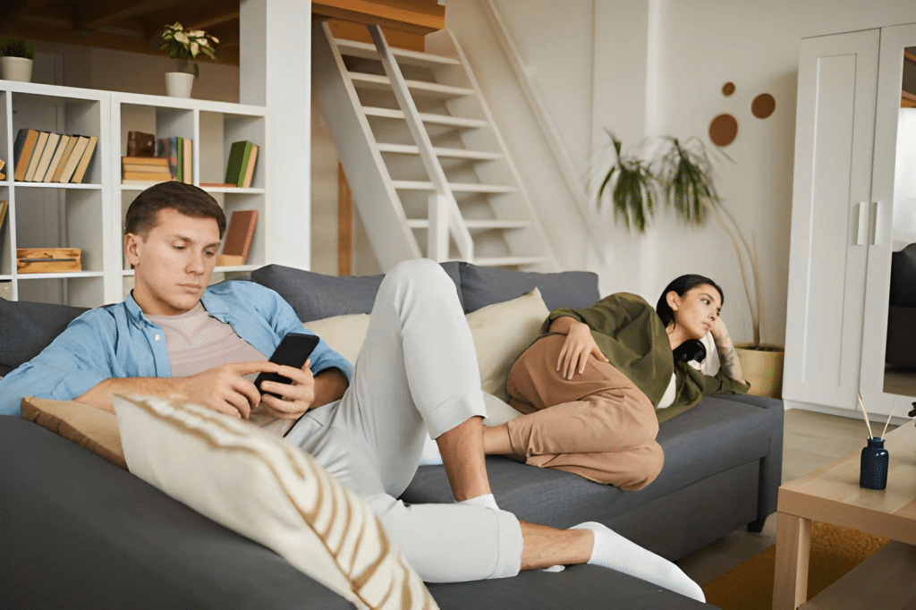 Bored couple lounging at home